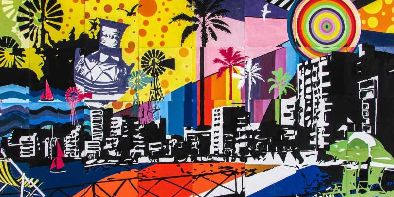 Mural vibrante de Pop Art com elementos tropicais e formas abstratas