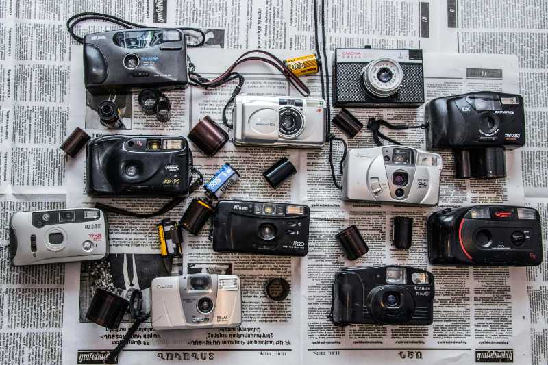 Vintage Cameras on a Newspaper