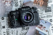Vintage Zenit Camera on Newspaper Background - jigsaw puzzle