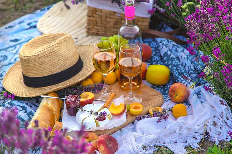 Wine and fruits in a lavender field