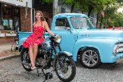 Woman next to motorcycle and car - jigsaw puzzle