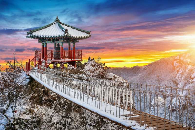 Yaksaam temple at sunset geumosan mountains in winter famous mountains in south korea