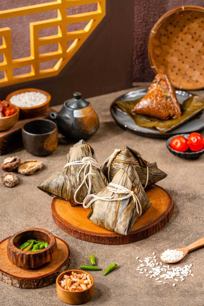 Zongzi or bakcang is a traditional chinese rice dish made of glutinous rice